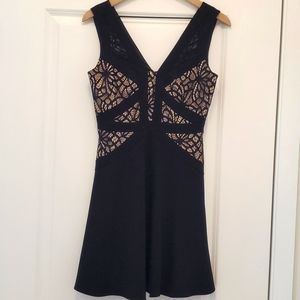 Dress in black and nude